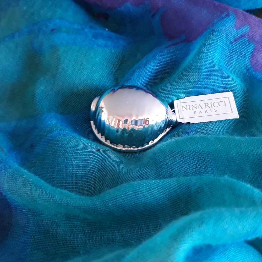 Nina Ricci Paris cowrie shell brooch